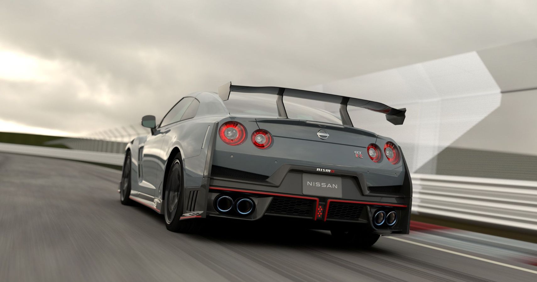 2024-nissan-gt-r-rear-angle-driving