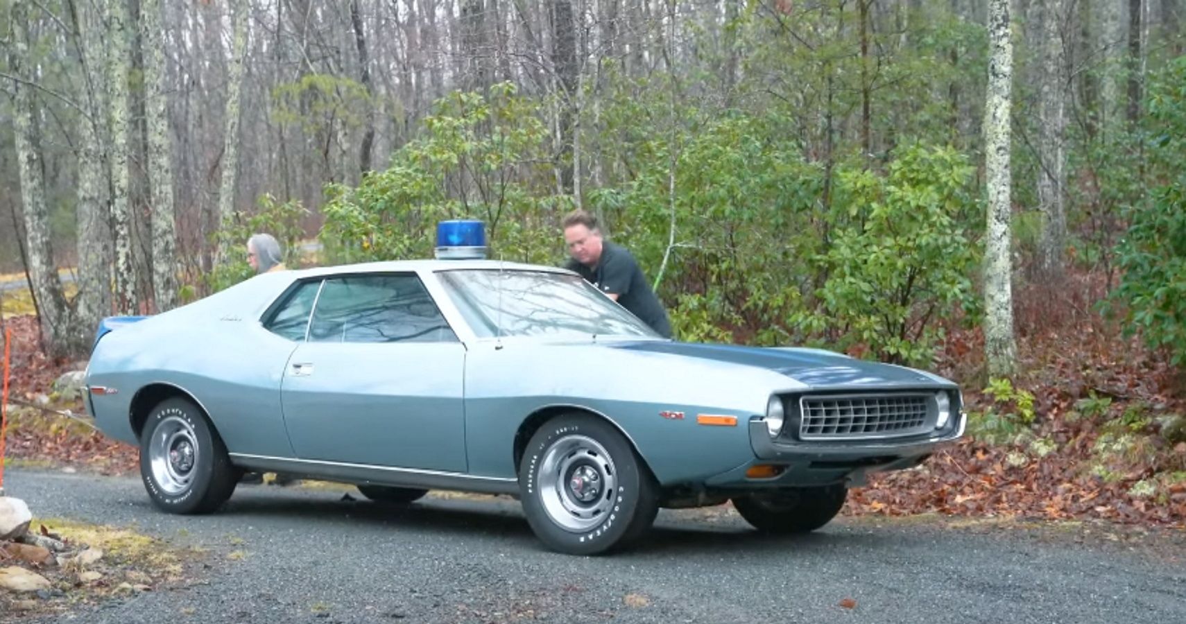Dennis Collins steers a 1972 AMC Javelin during towing