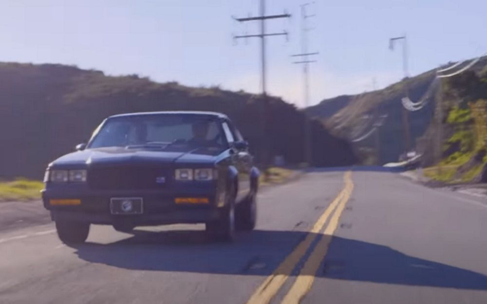 Driving a 1987 Buick GNX on a two-lane road