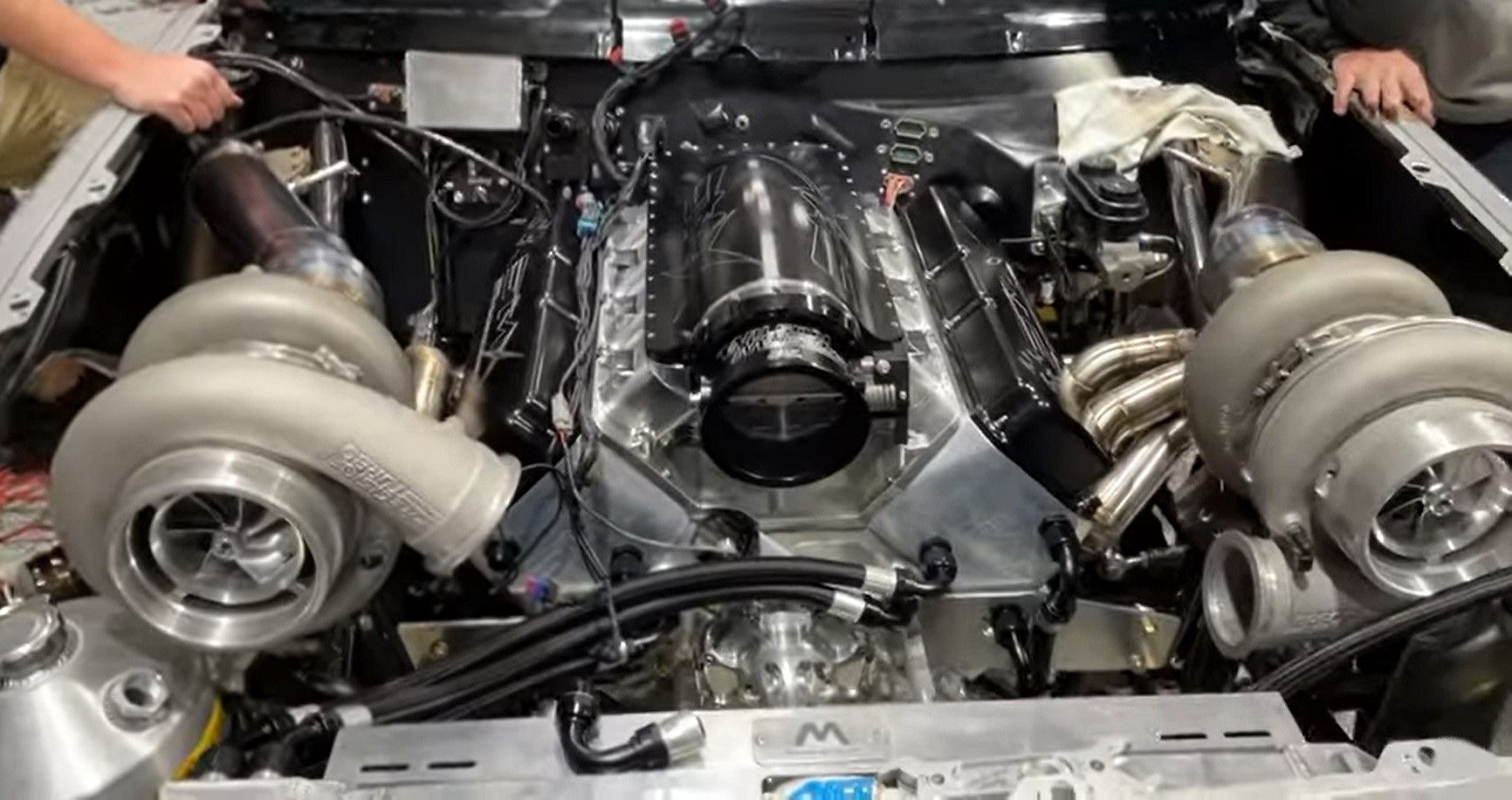 cleetus-mcfarland-struggles-to-fit-the-9-3-liter-amx-engine-into-a