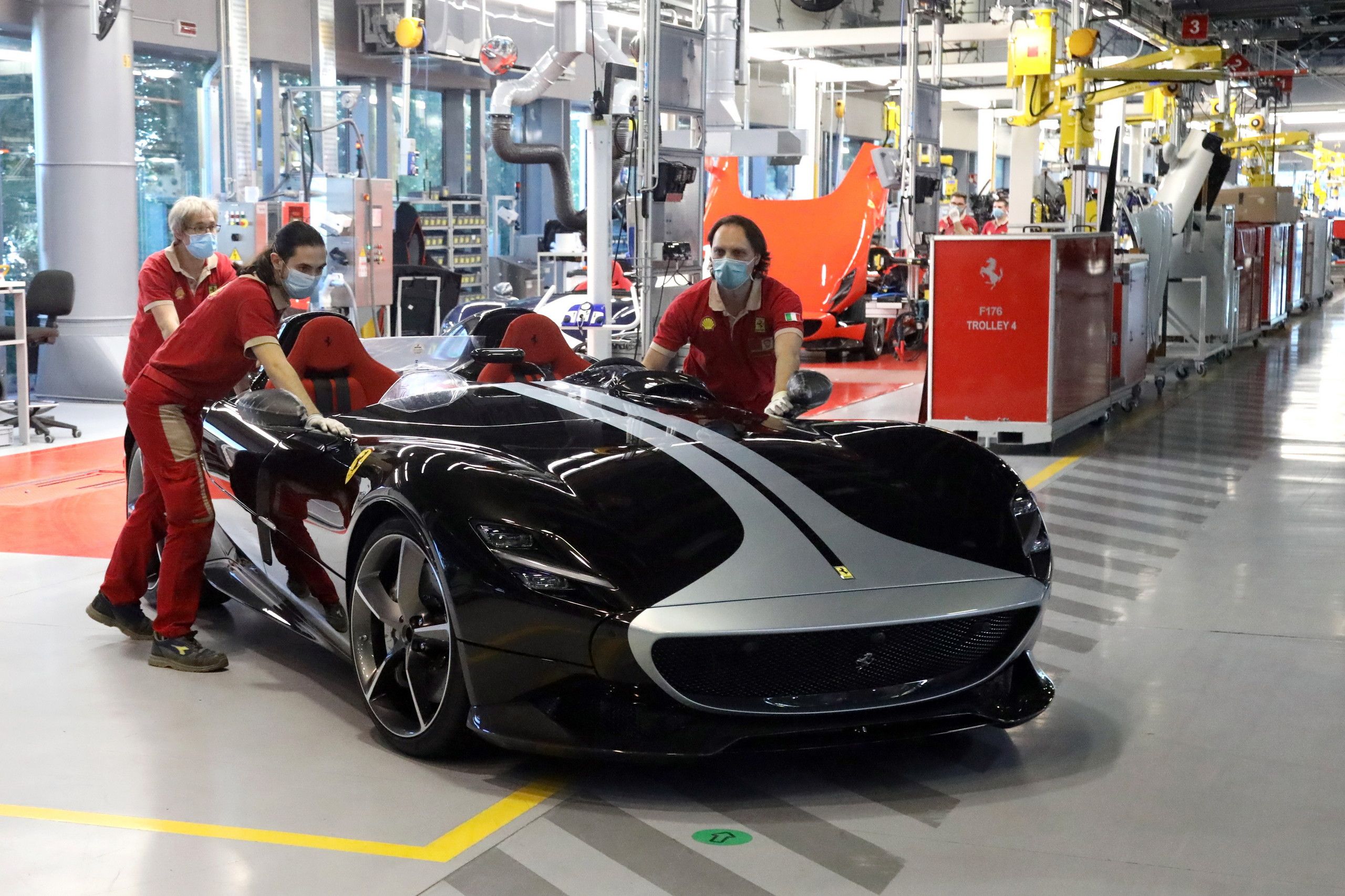 Ferrari Employees working on a Ferrari