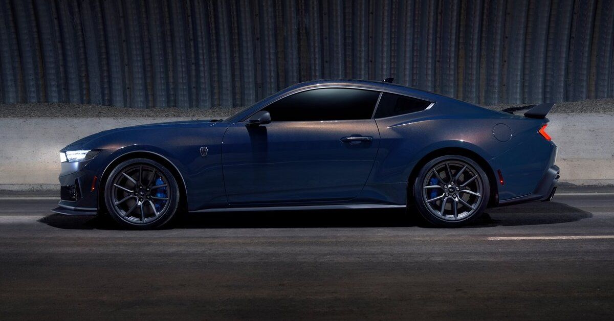 A blue 2024 Ford Mustang Dark Horse parked