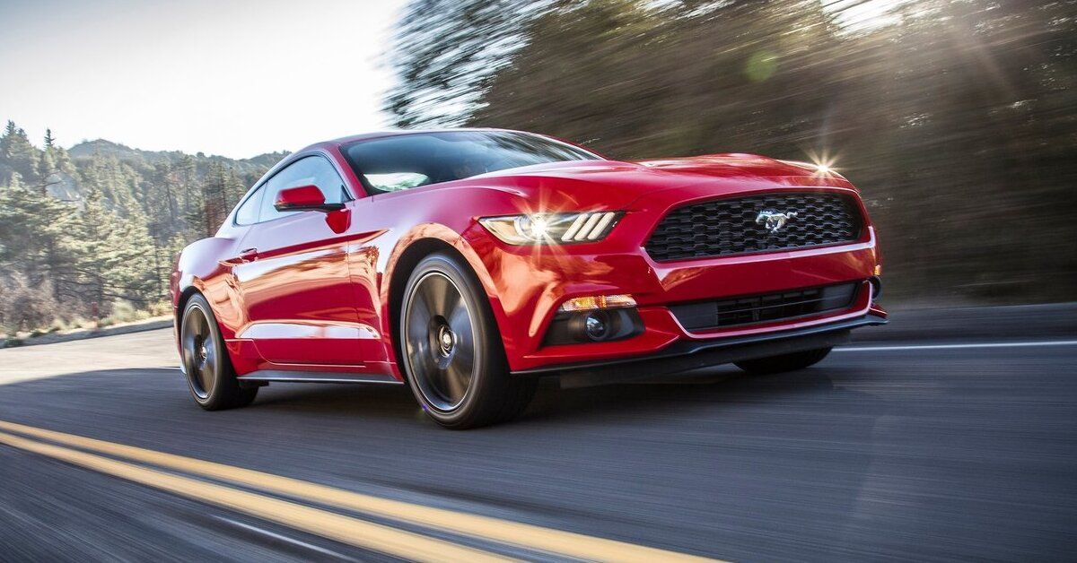 Red Ford Mustang EcoBoost Crusing On Highway