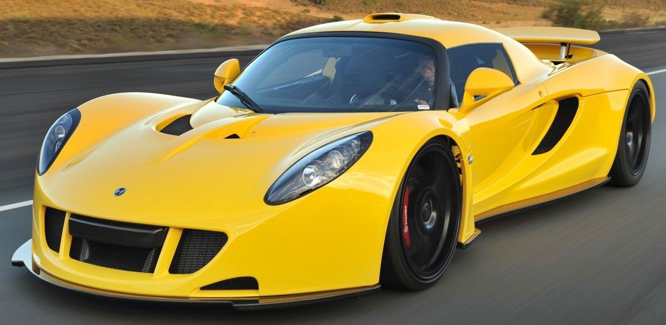 Yellow 2011 Hennessey Venom GT driven on the road
