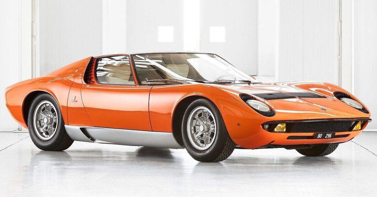 An orange 1968 Lamborghini Miura P400 parked