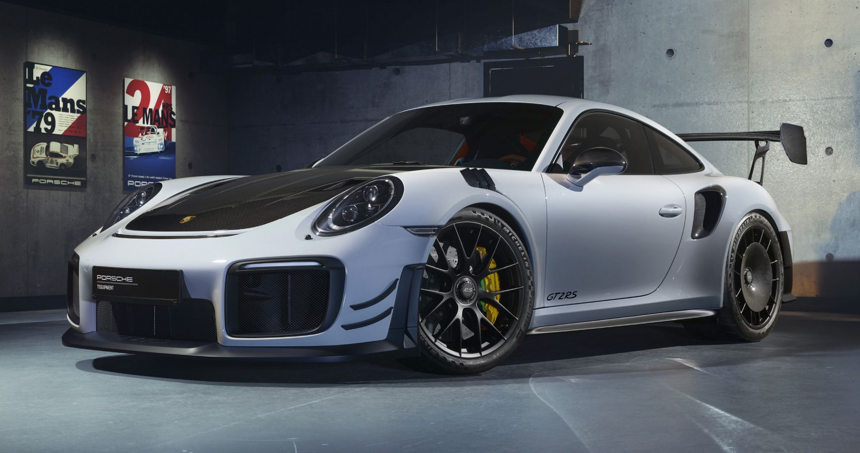 Gray 2019 Porsche 911 GT2 RS parked indoors under studio lighting