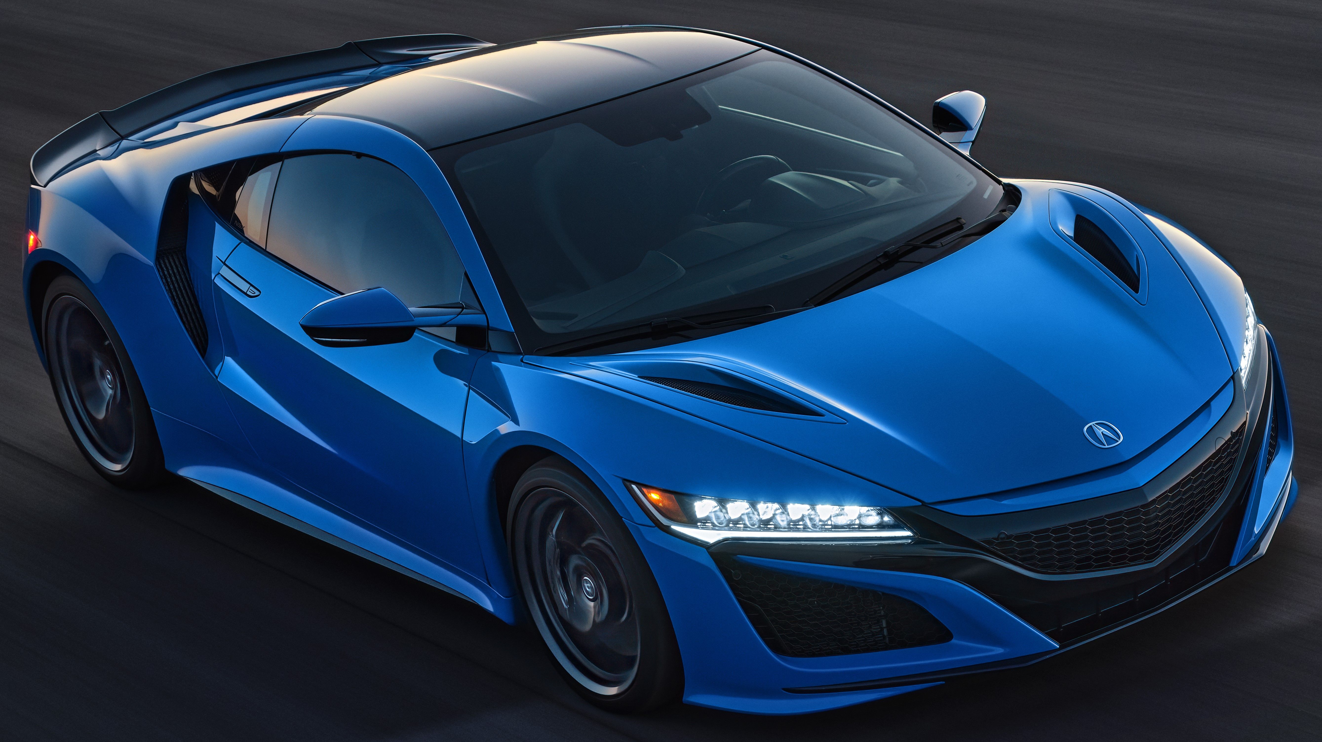 Blue Acura NSX driven on the track