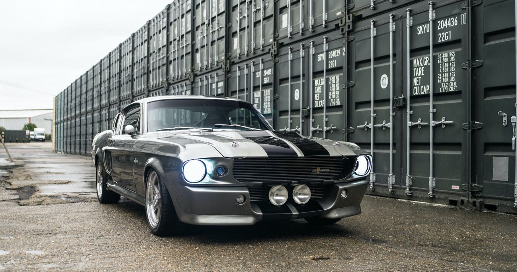 A gray 1967 Eleanor Ford Shelby GT 500 is parked