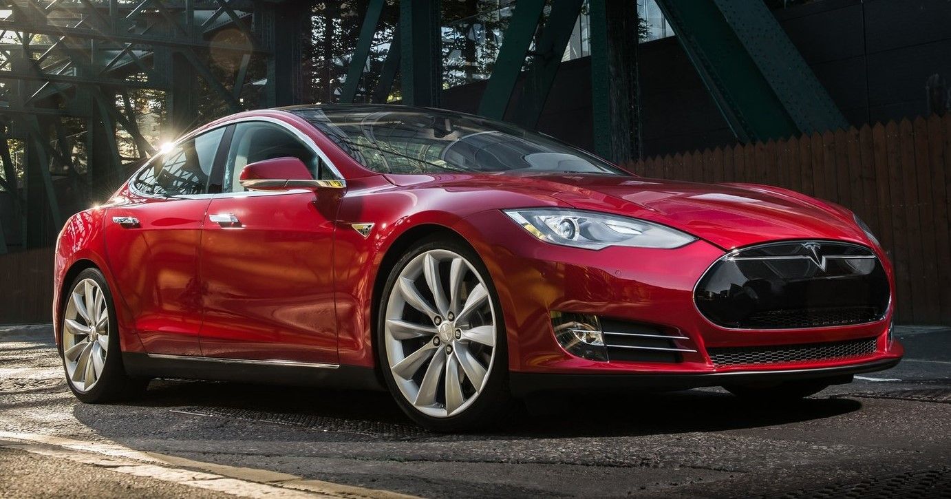 The deep red 2013 Tesla Model S. 