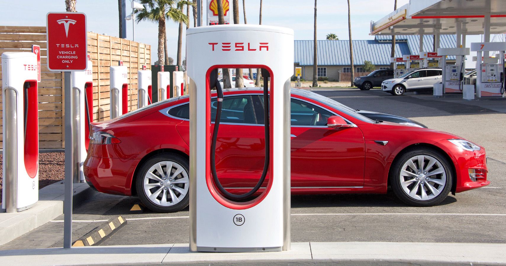 Tesla Supercharger Charging An EV