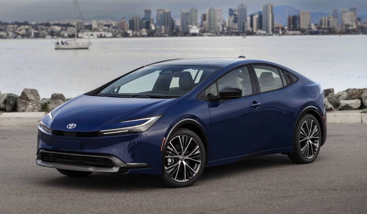 The 2023 Toyota Prius (Dark blue) - Front Left angle