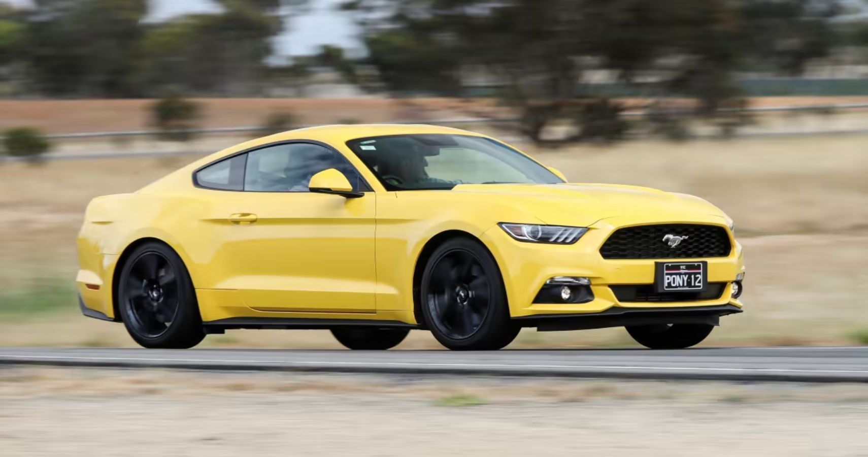 Yellow Mustang Ecoboost driving