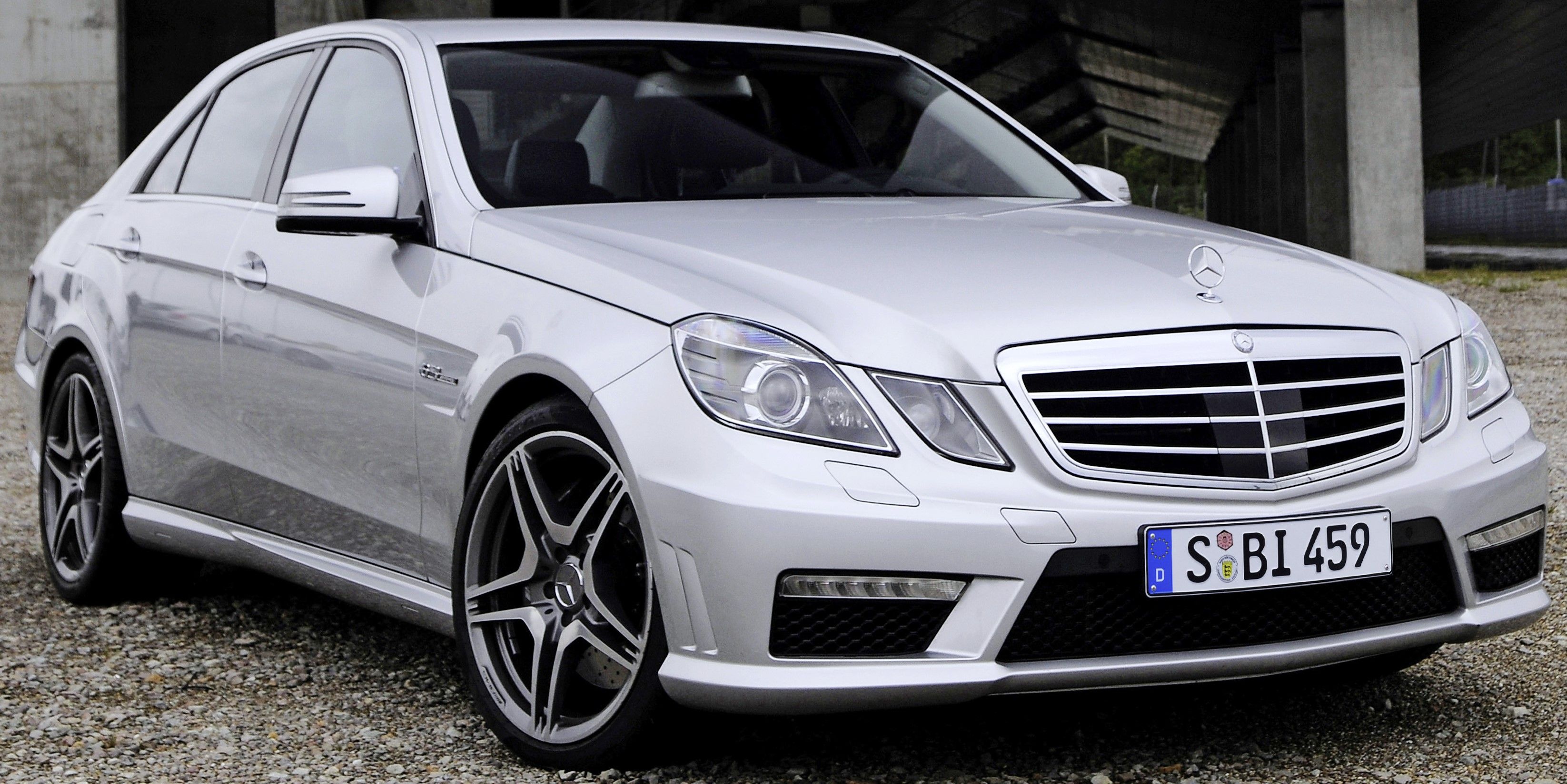 Silver Mercedes-Benz E 63 AMG W212 parked outdoors