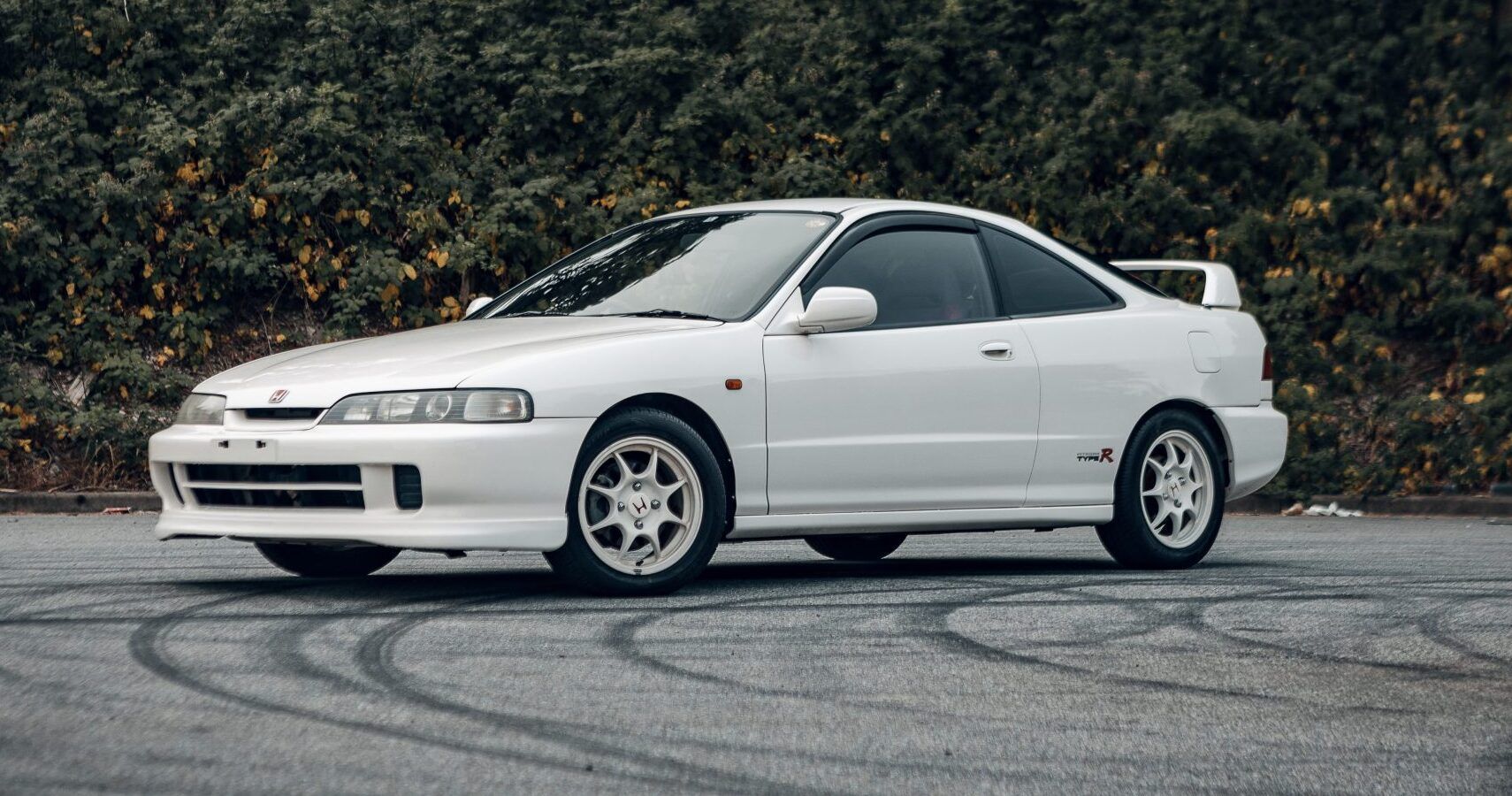 A white 1996 Honda Integra Type R parked