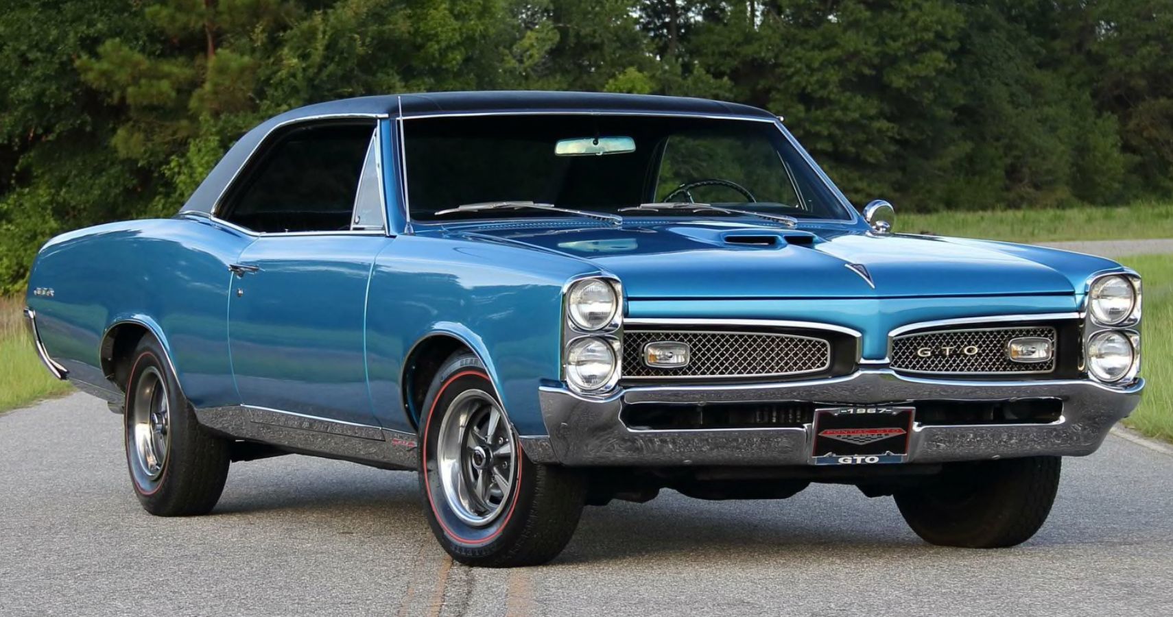 Blue 1967 Pontiac GTO Black Vinyl Top on Street