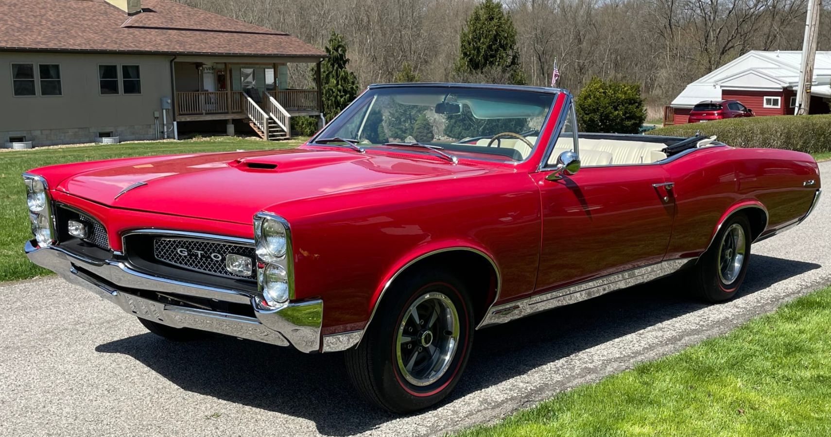 Red 1967 Pontiac GTO Convertible in Driveway
