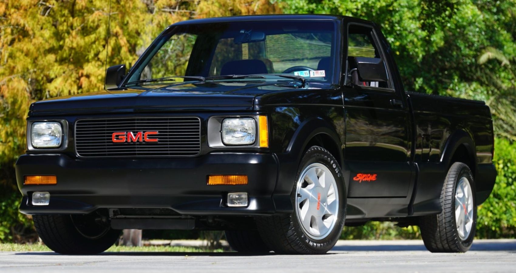 Black 1991 GMC Syclone Parked