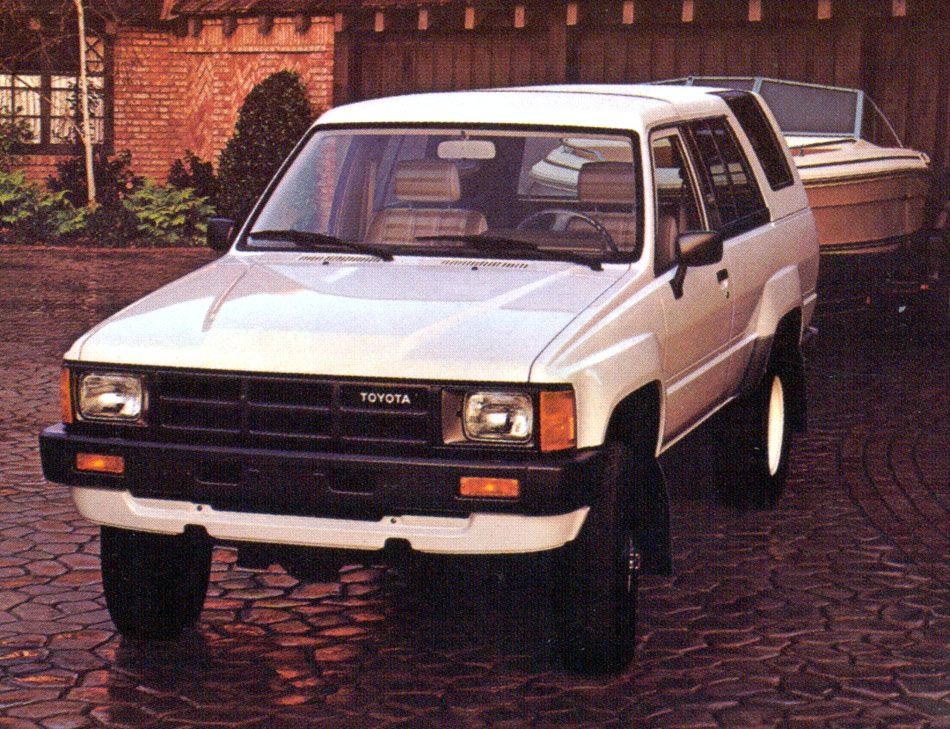 Front shot of 1985 Toyota 4Runner white with boat