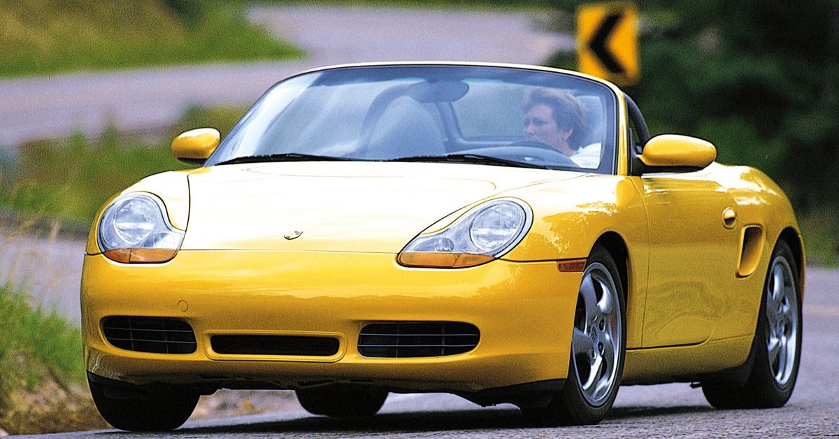 Yellow 1997 Porsche Boxster S 90's sports cars