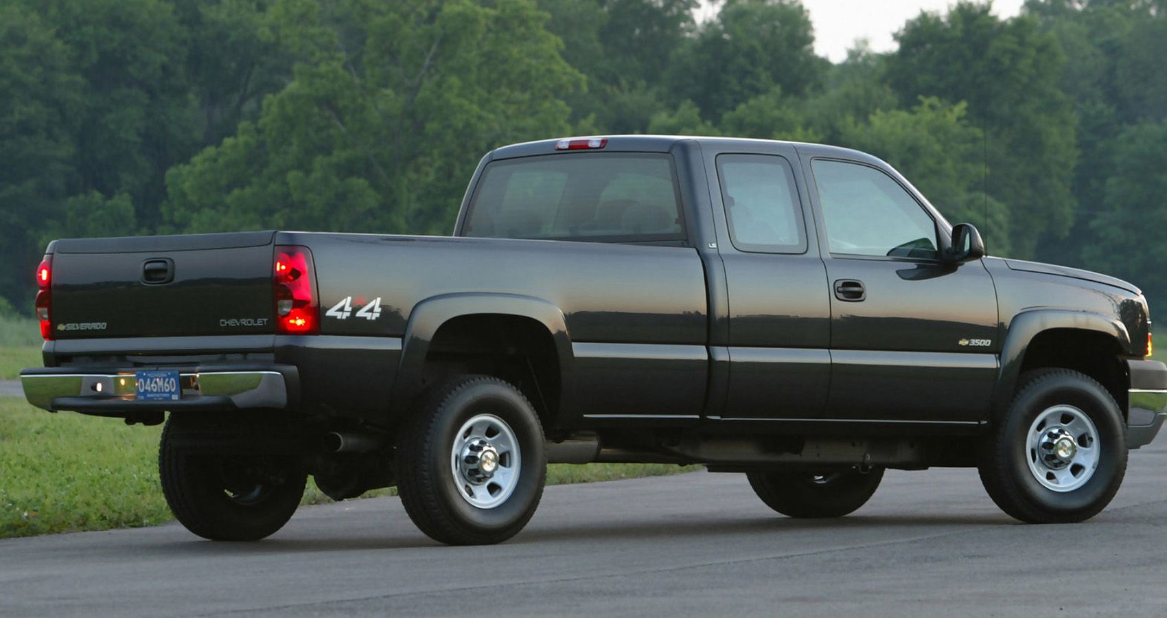 2004 Chevrolet Silverado in black rear view 