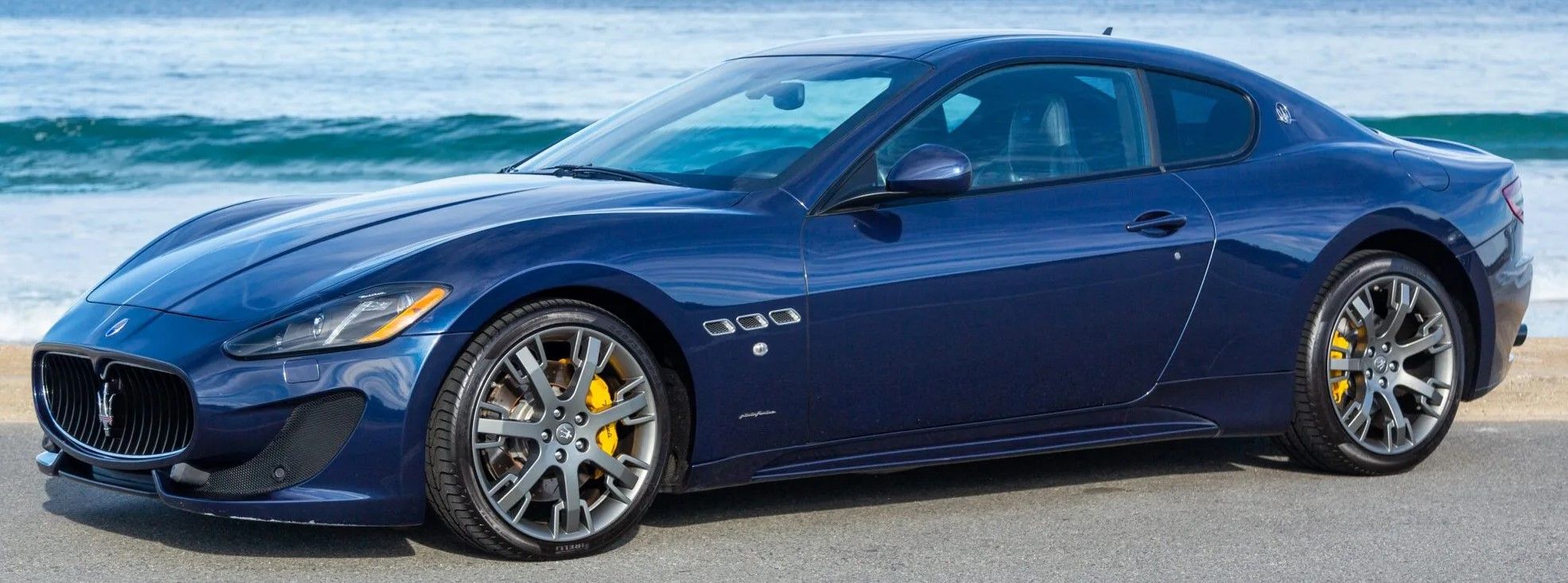 Blue 2014 Maserati GranTurismo Sport parked outdoors