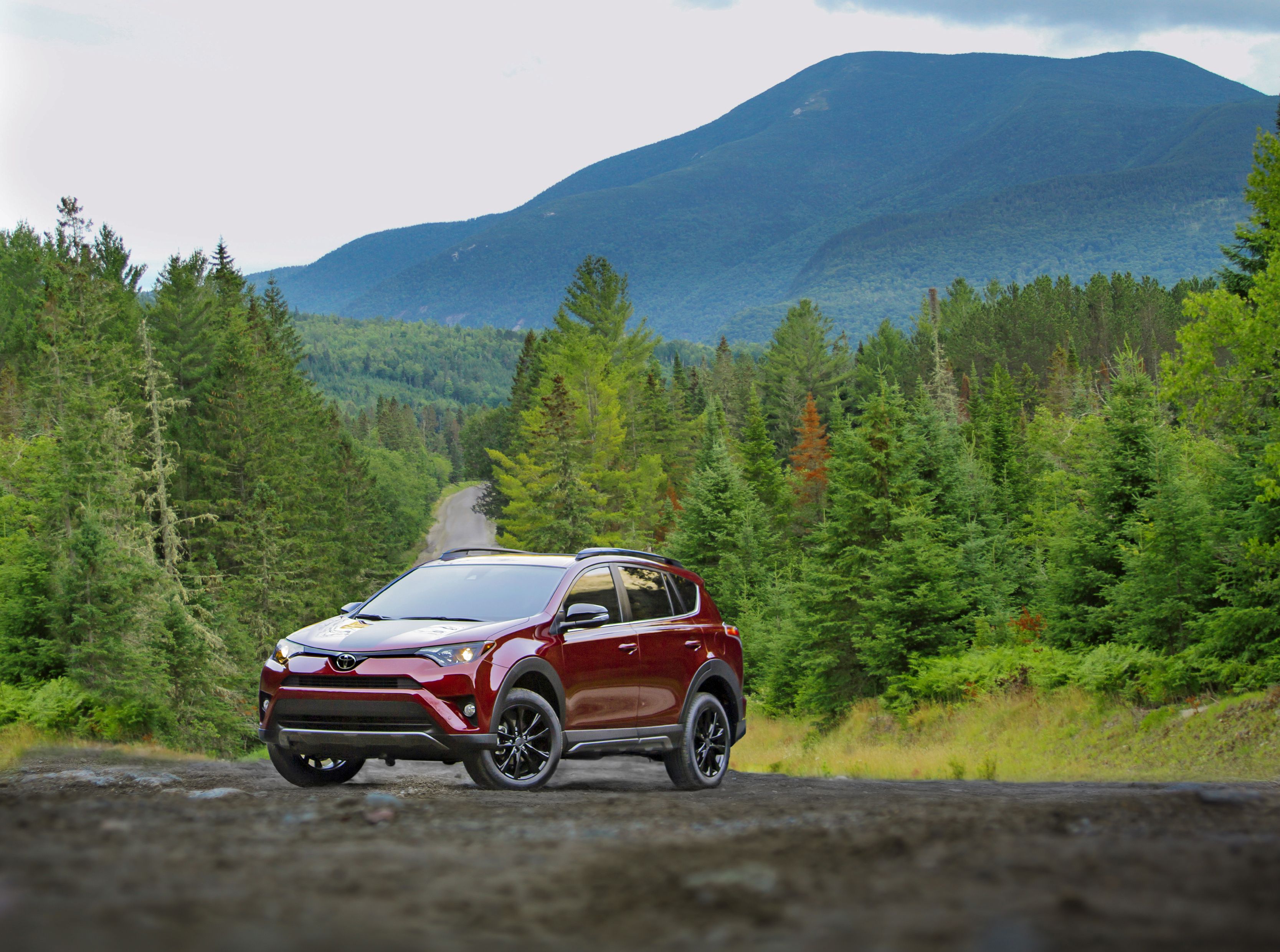 Red Toyota RAV4 off-road 2018