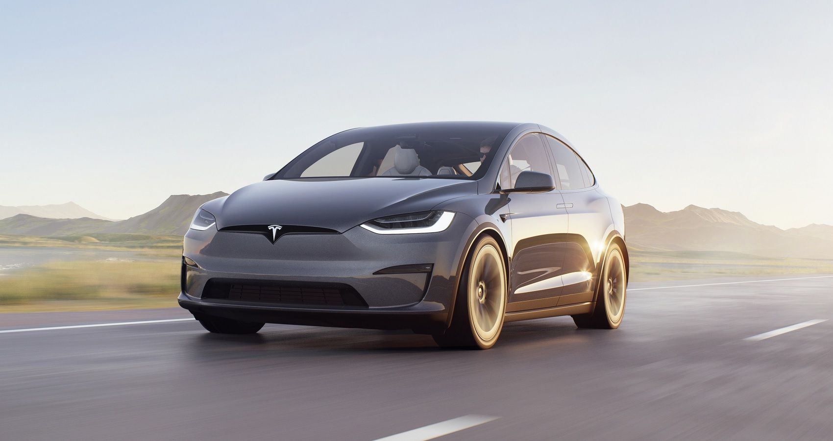 Grey 2023 Tesla Model X Driving On Highway