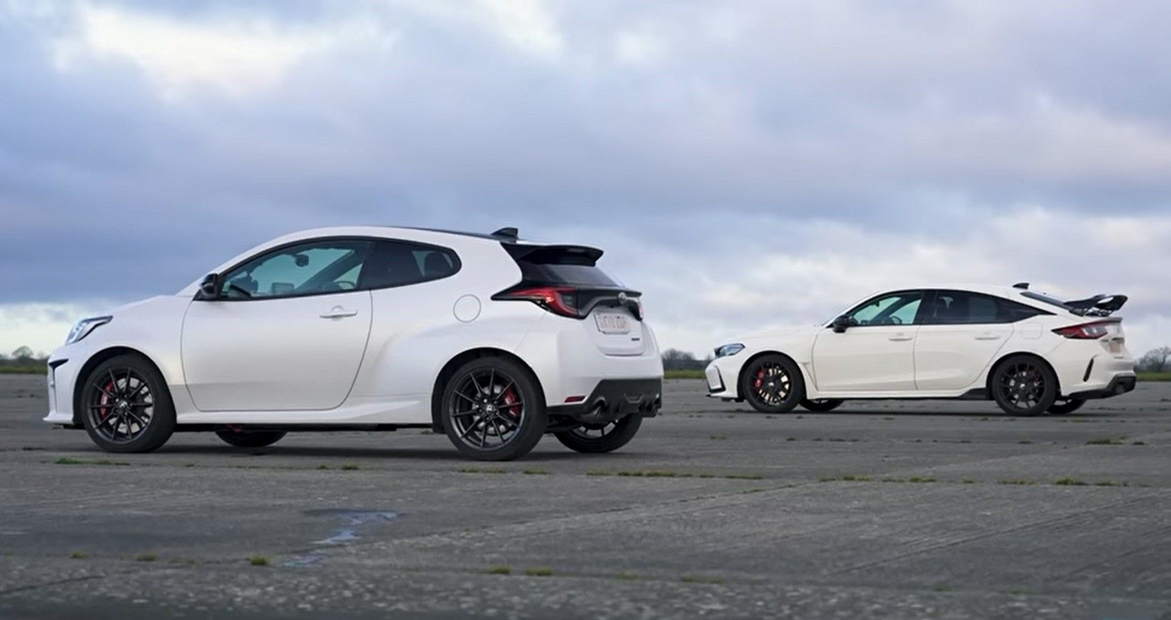 Toyota GR Yaris and Honda Civic Type R, white, side by side