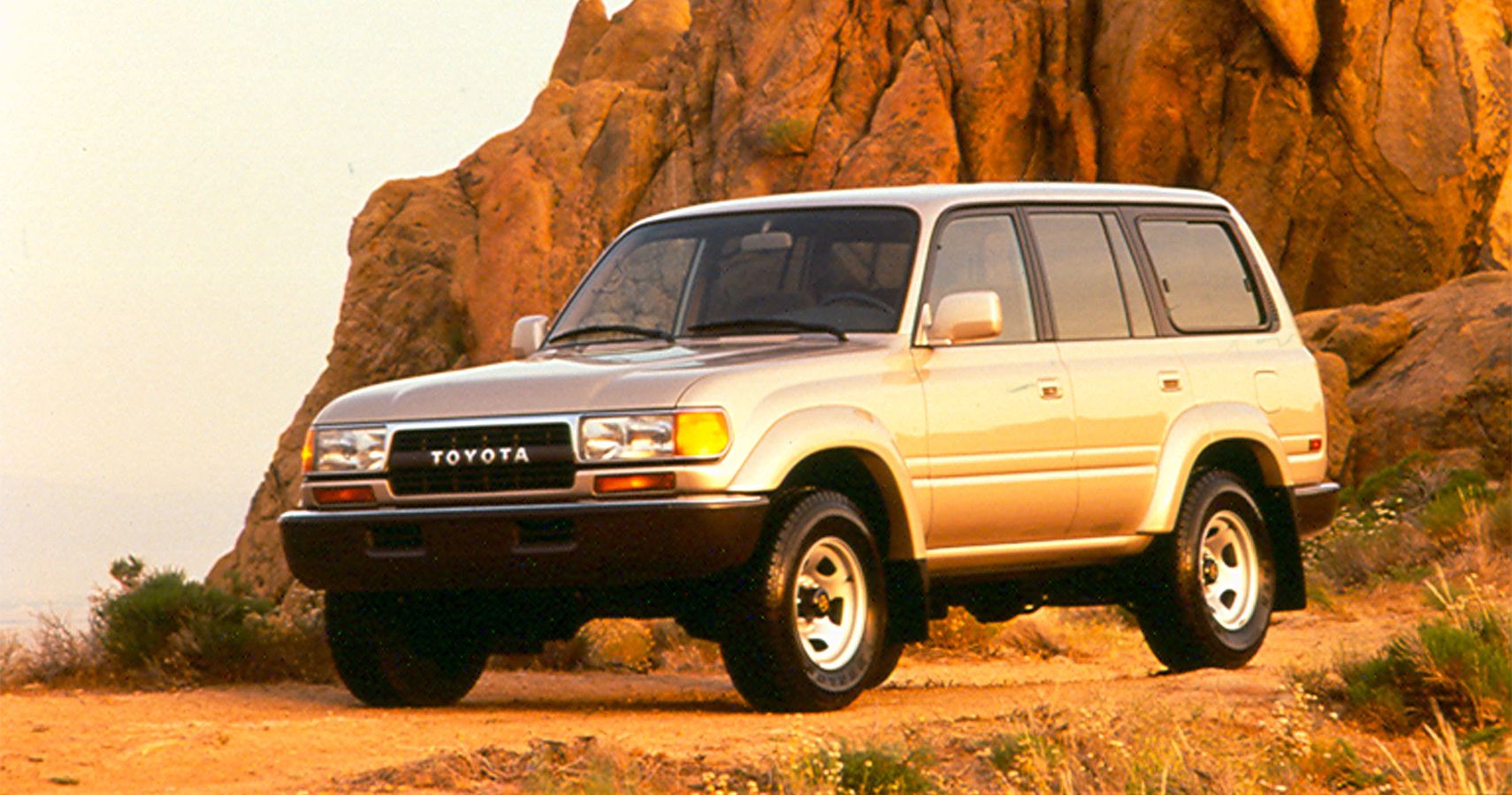 Front angle shot of 1994 Toyota Land Cruiser J80 with mountain background