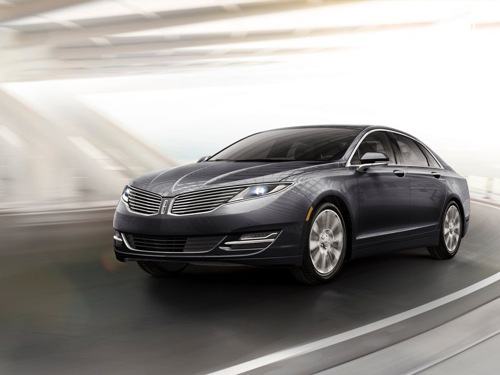 Gray 2015 Lincoln MKZ Hybrid on the road