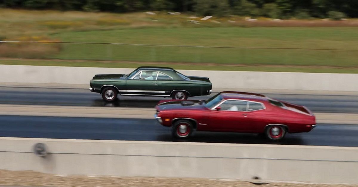 Watch This Ford Torino 429 Super Cobra Jet Get Bitten By A Plymouth GTX