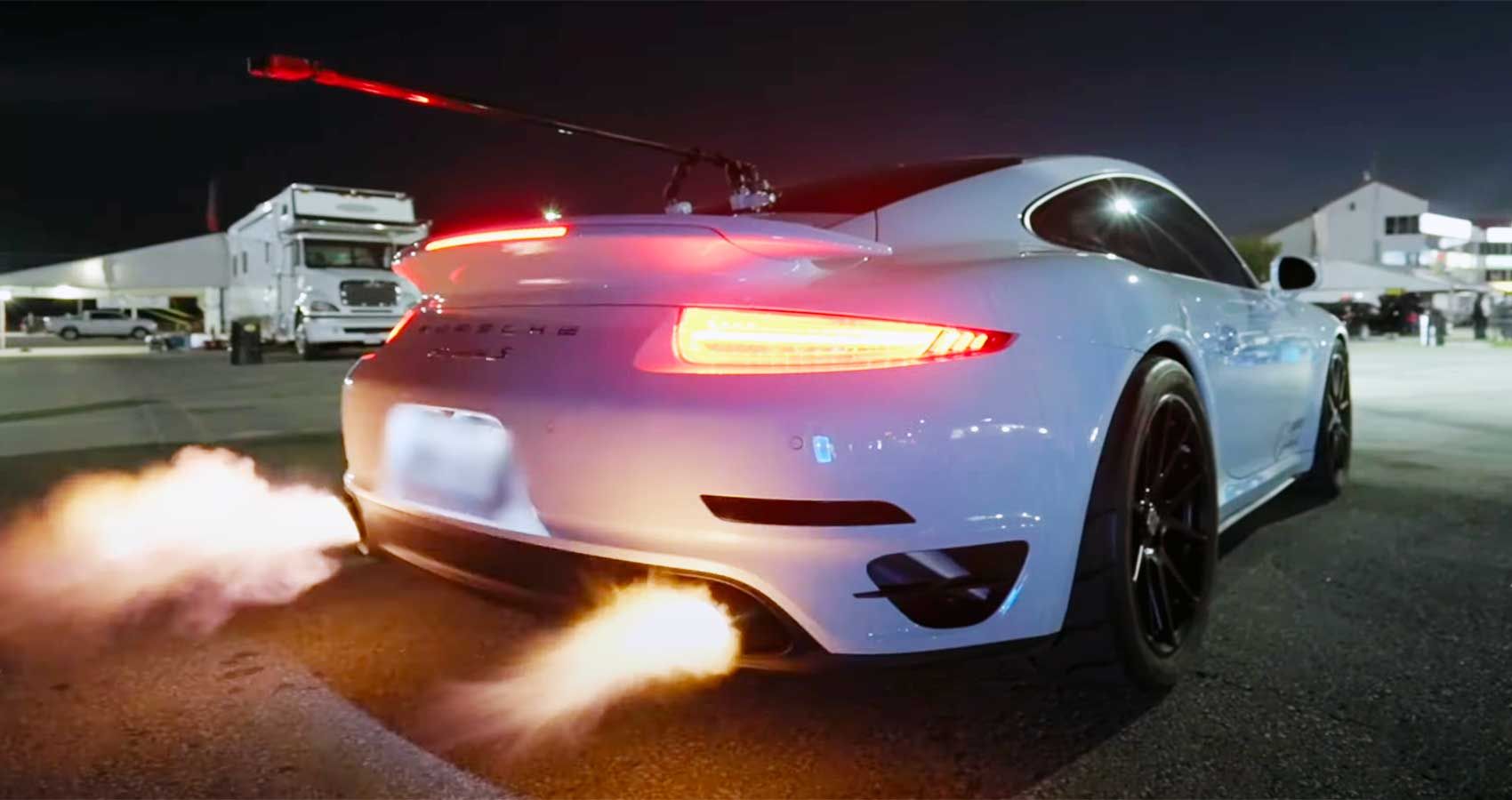 White Porsche 911 Turbo S Shooting flames
