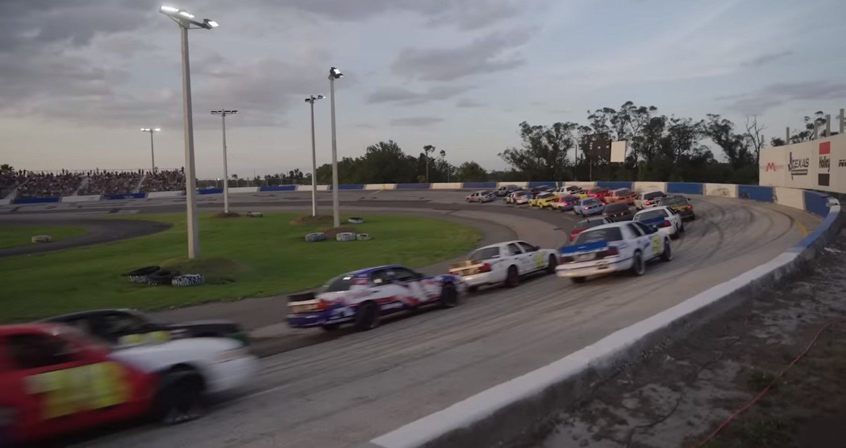 Cleetus' Freedom 500 Crown Victoria race, view of cars racing on oval