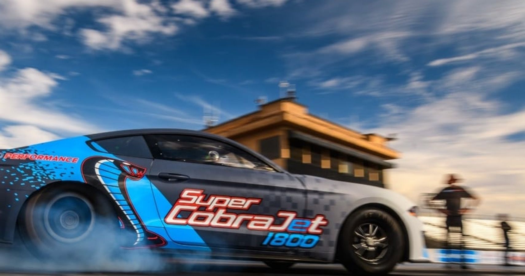 The Ford Mustang Super Cobra Jet 1800 on a dragstrip