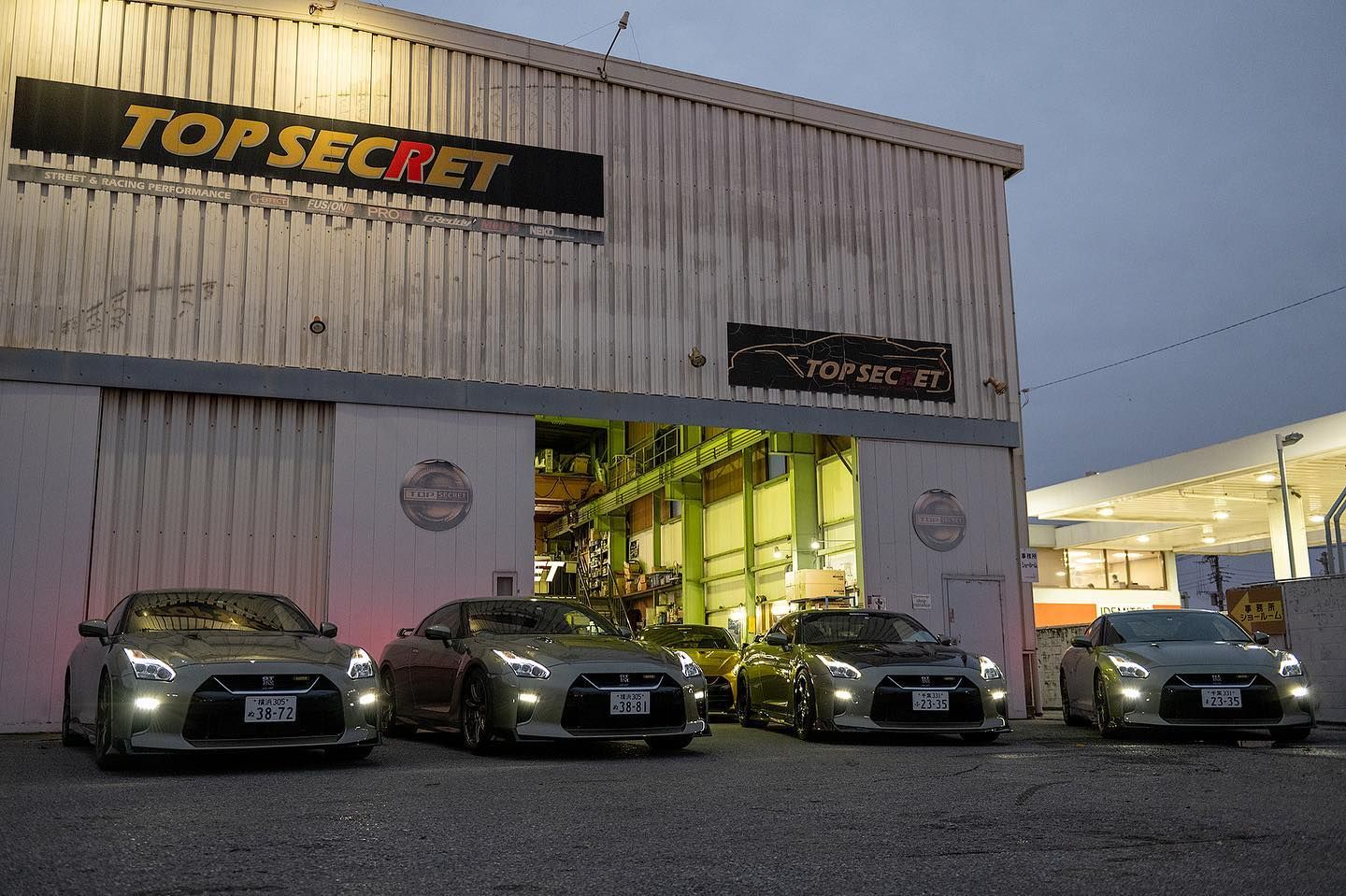 Nissan GT-R T-Spec in front of the Top Secret tuning shop