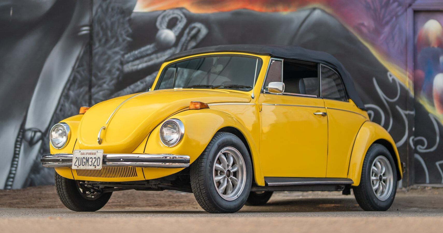 A yellow 1972 Volkswagen Beetle parked