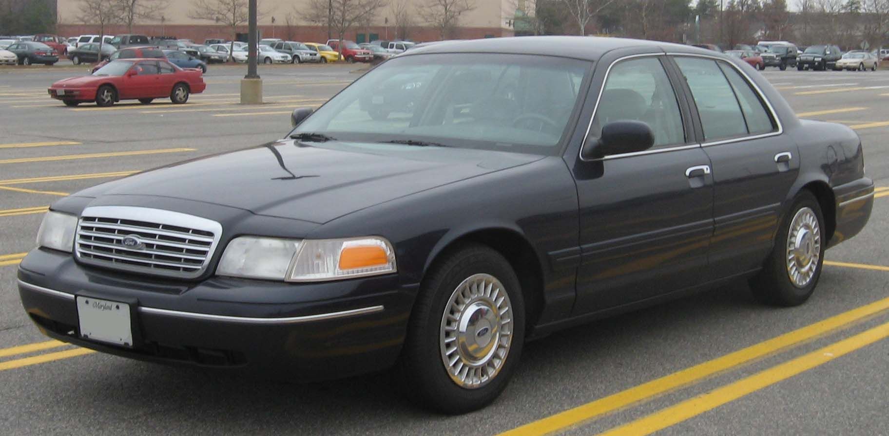 2002 Ford Crown Victoria black parked