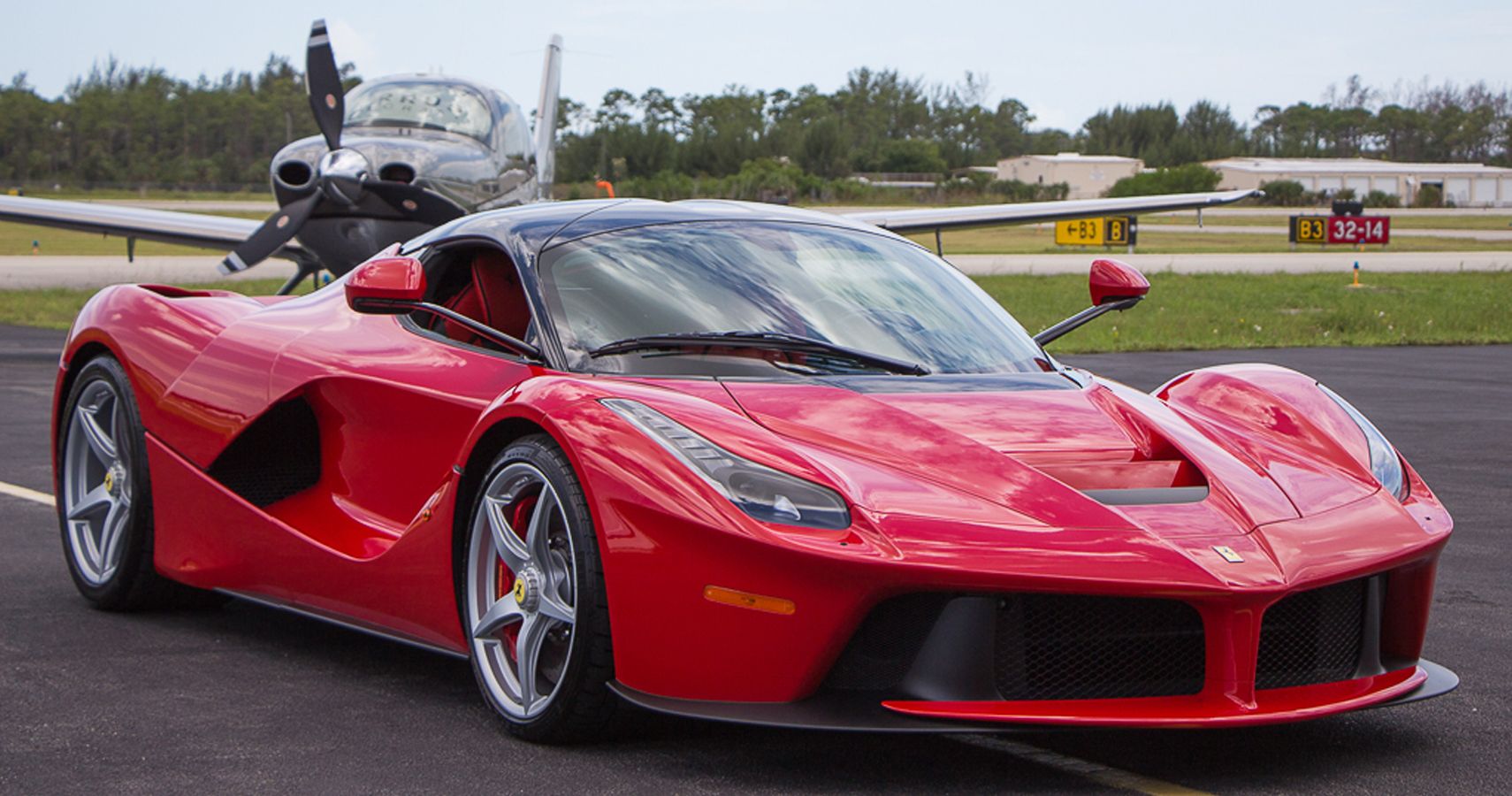 Red 2015 Ferrari LaFerrari Mid-Engine Mild Hybrid Sports Car