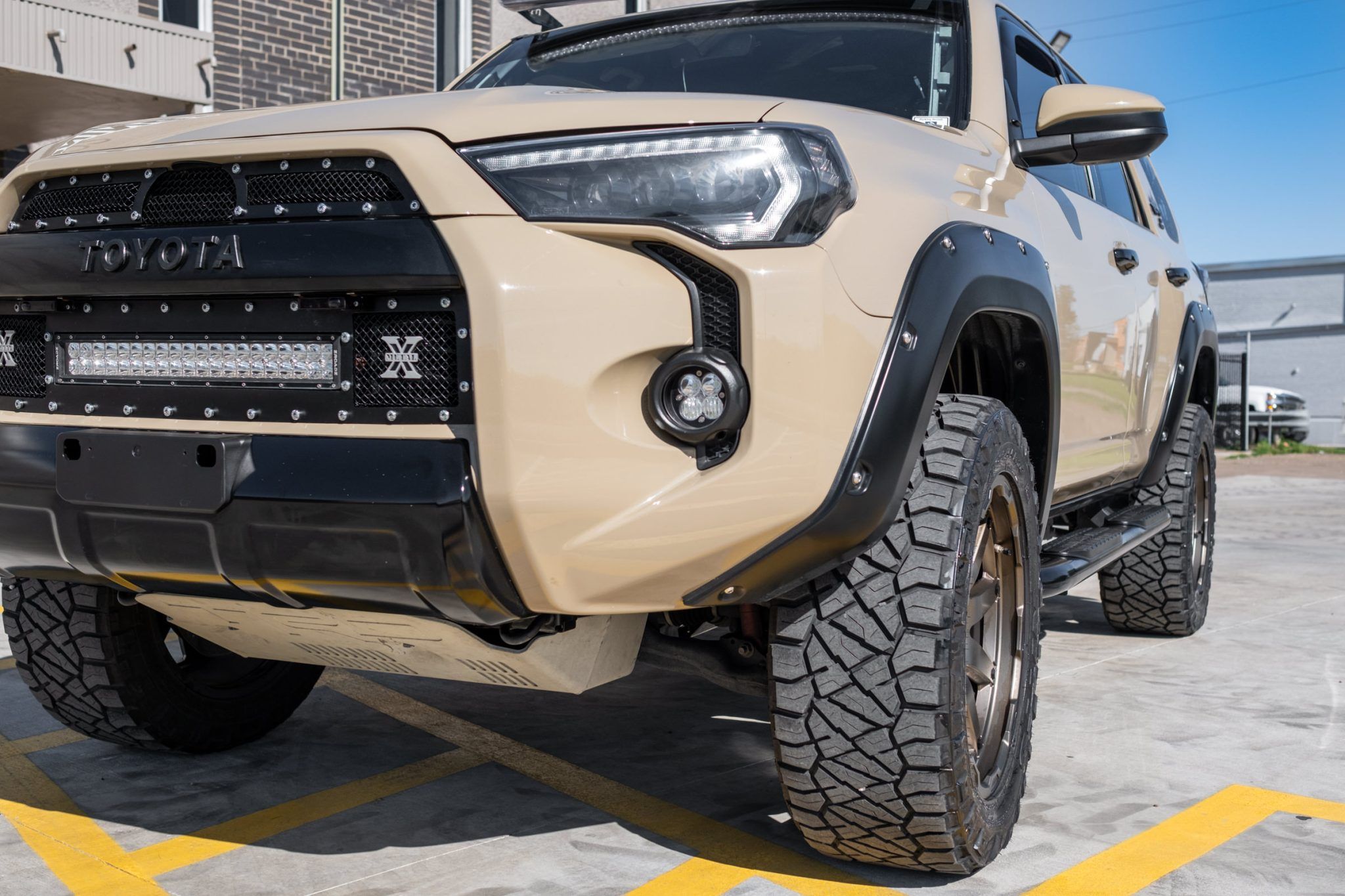 Toyota 4runner 2016 in beige color with visible beige skid plate