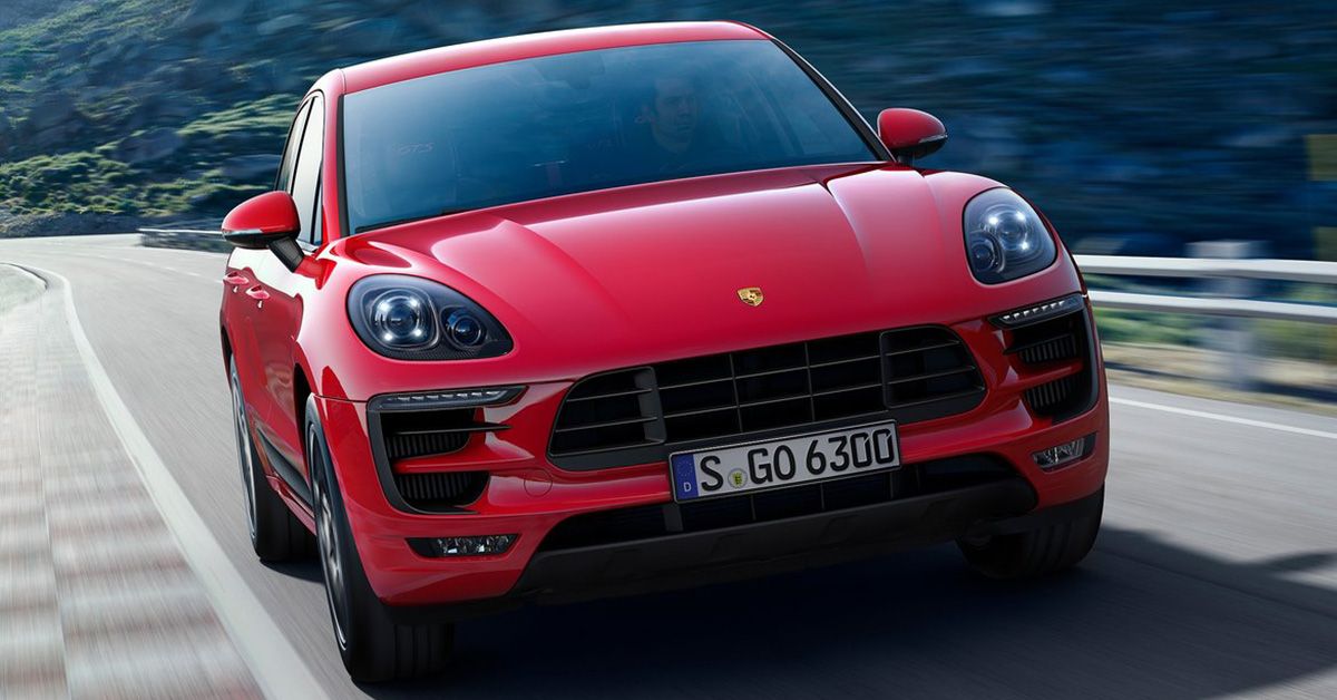 Porsche Macan 2016 in red on the road