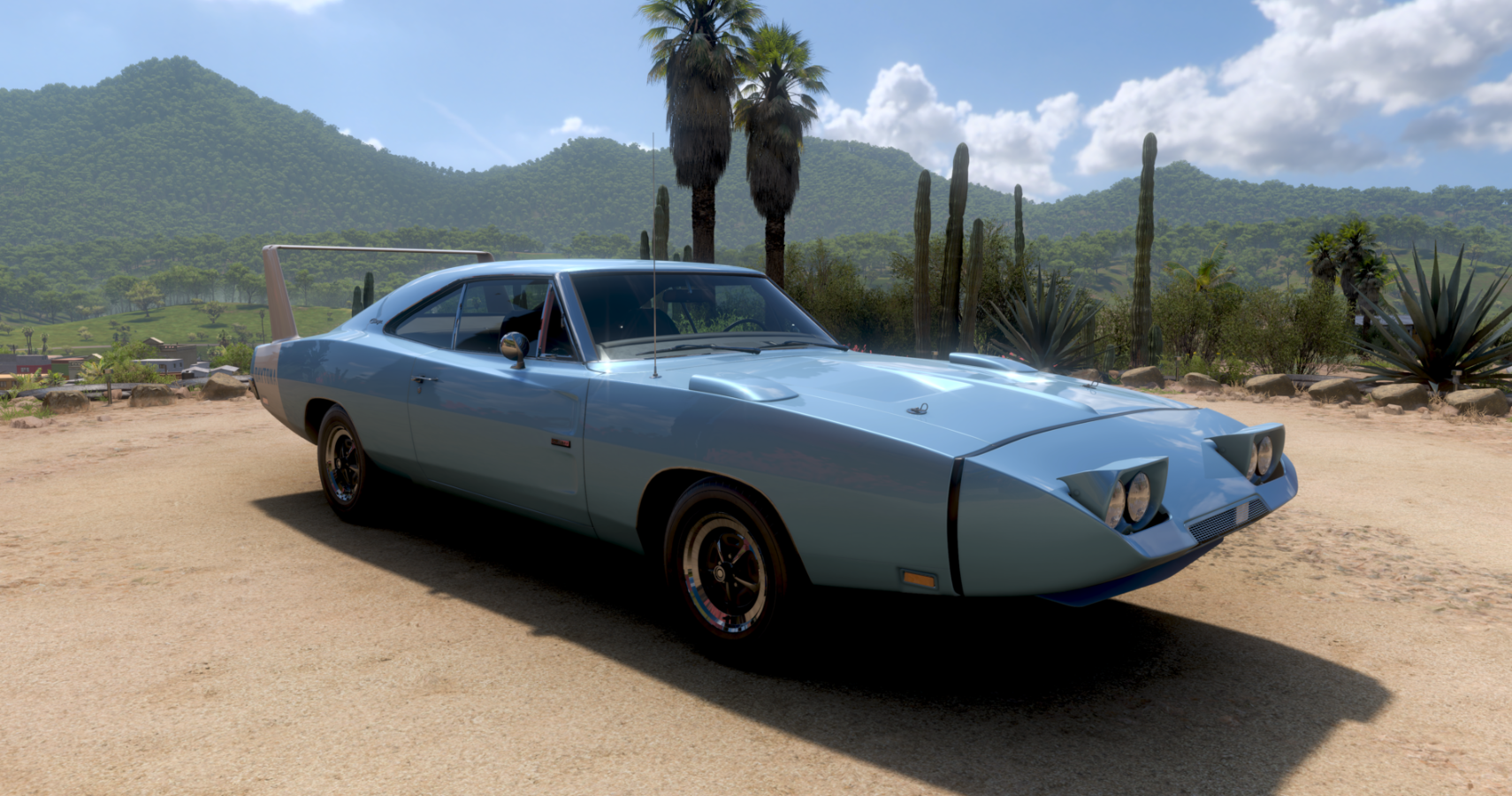 A blue 1969 Dodge Charger Daytona Hemi parked in FH5