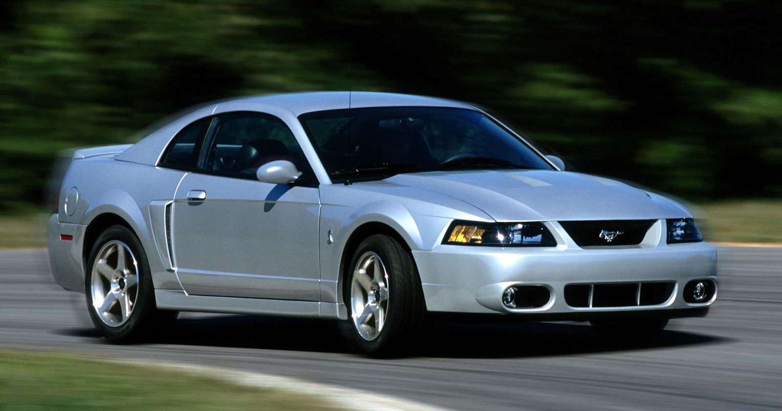 Silver 2003 Ford Mustang SVT Cobra being driven on a highway