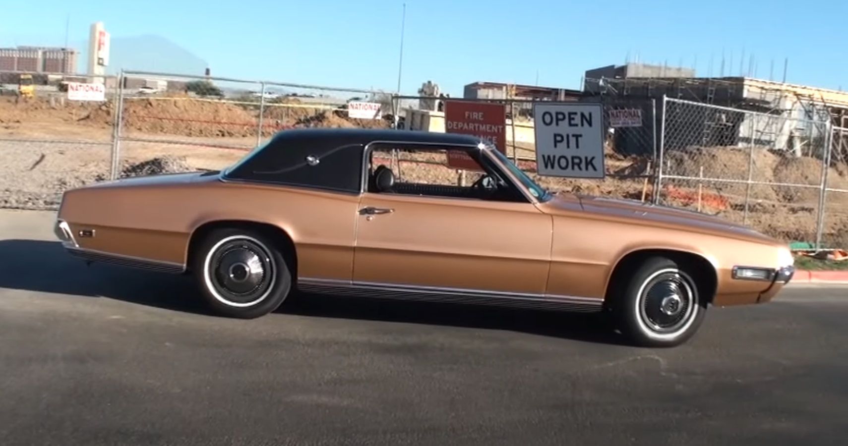 Side view of a 1969 Ford Thunderbird in Copper Flame Metallic paint