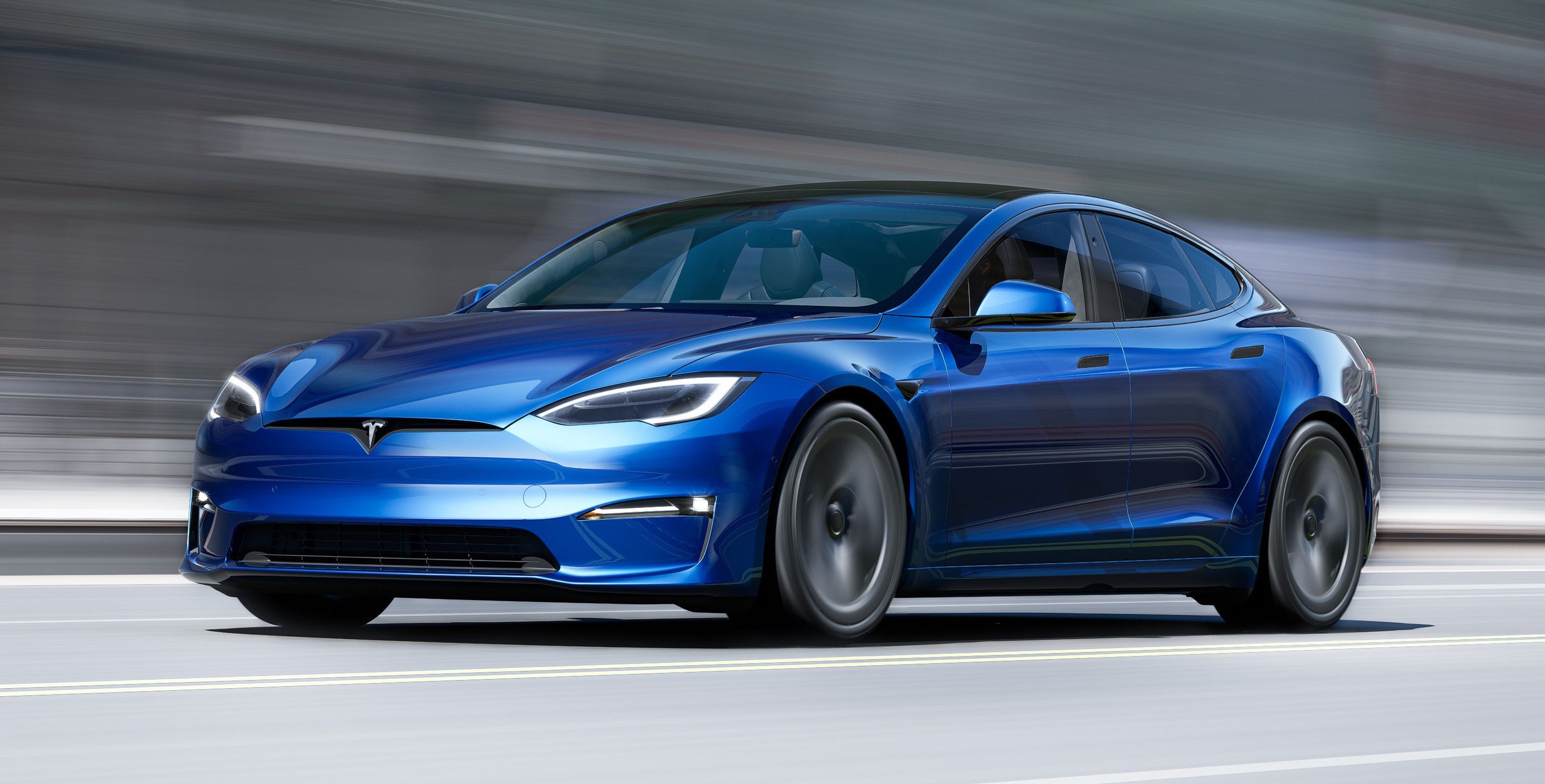 Tesla Model S Plaid blue in motion