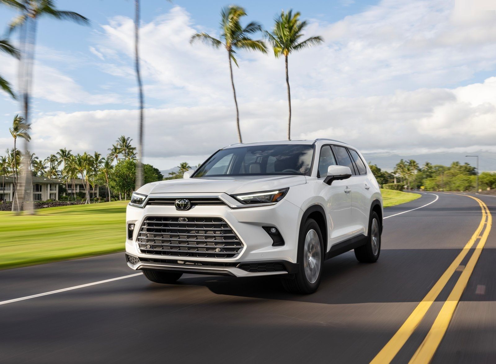 The Full Size Japanese SUV To Look Out For In 2024   2024 Toyota Highlander White Action Shot 