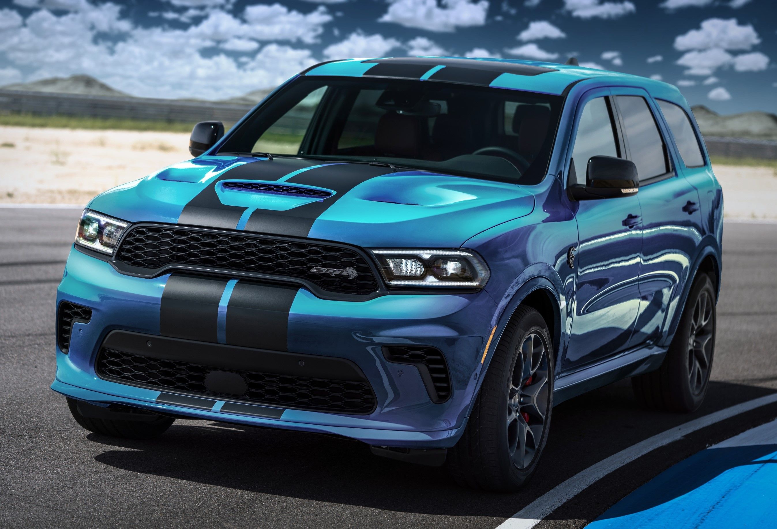 Blue 2023 Dodge Durango SRT Hellcat Premium on the track