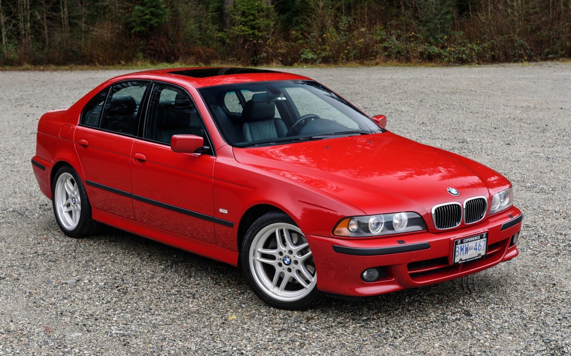 Red 2003 BMW 540i M Sport parked outdoors
