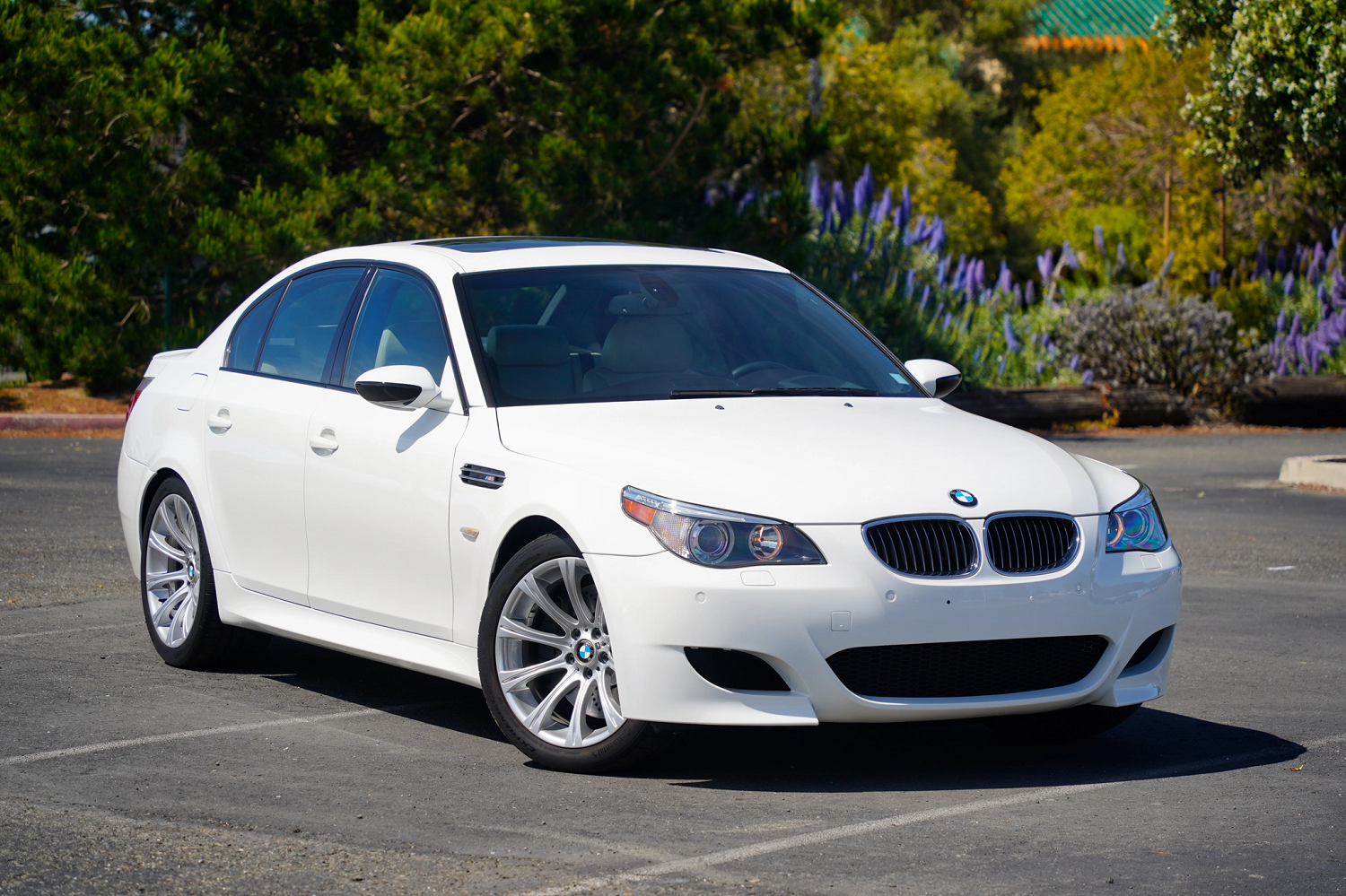 A 2006 BMW E60 M5 parked outside in sun