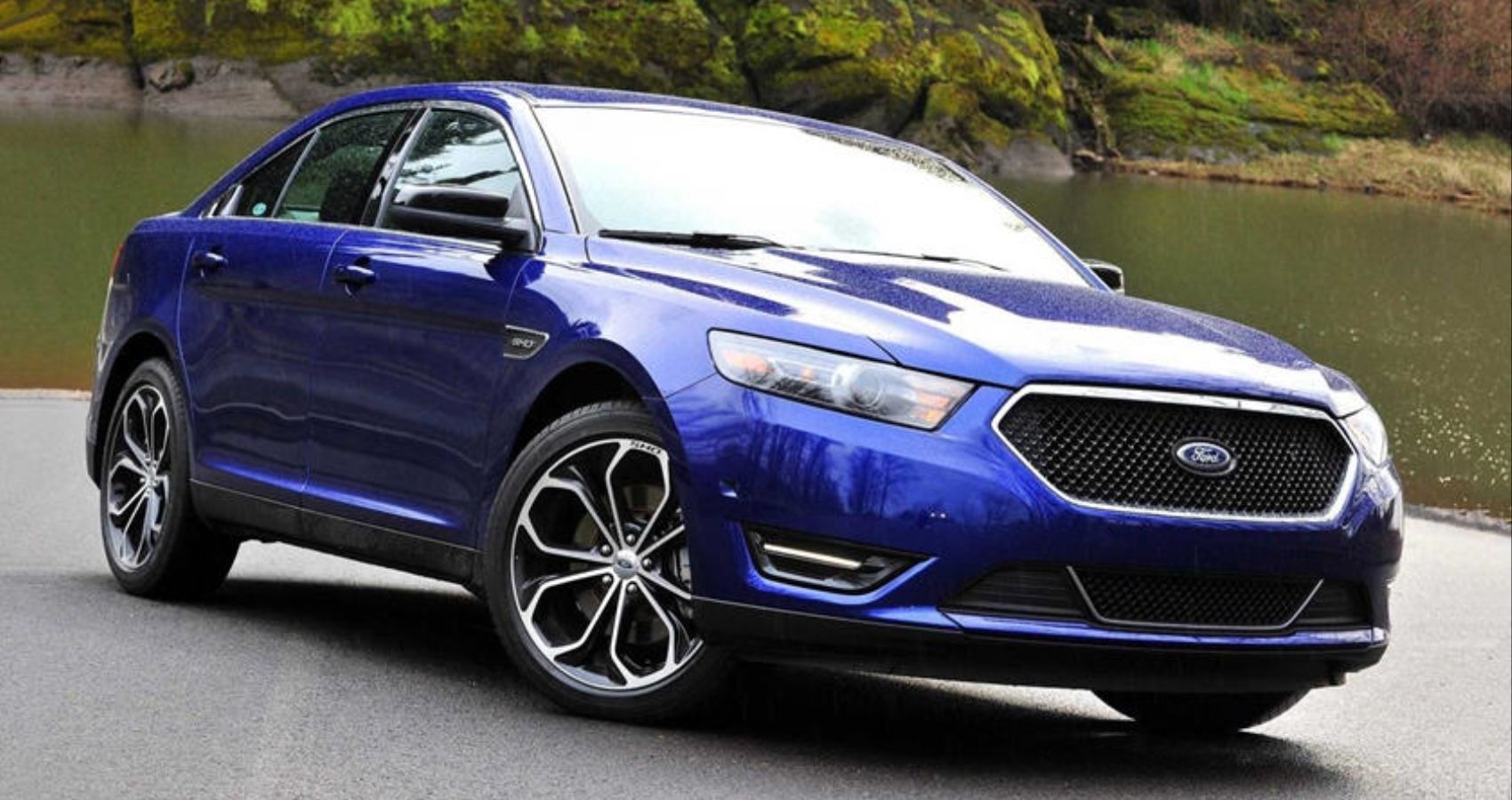 2019 Ford Taurus SHO parked looking from the front quarter angle in blue