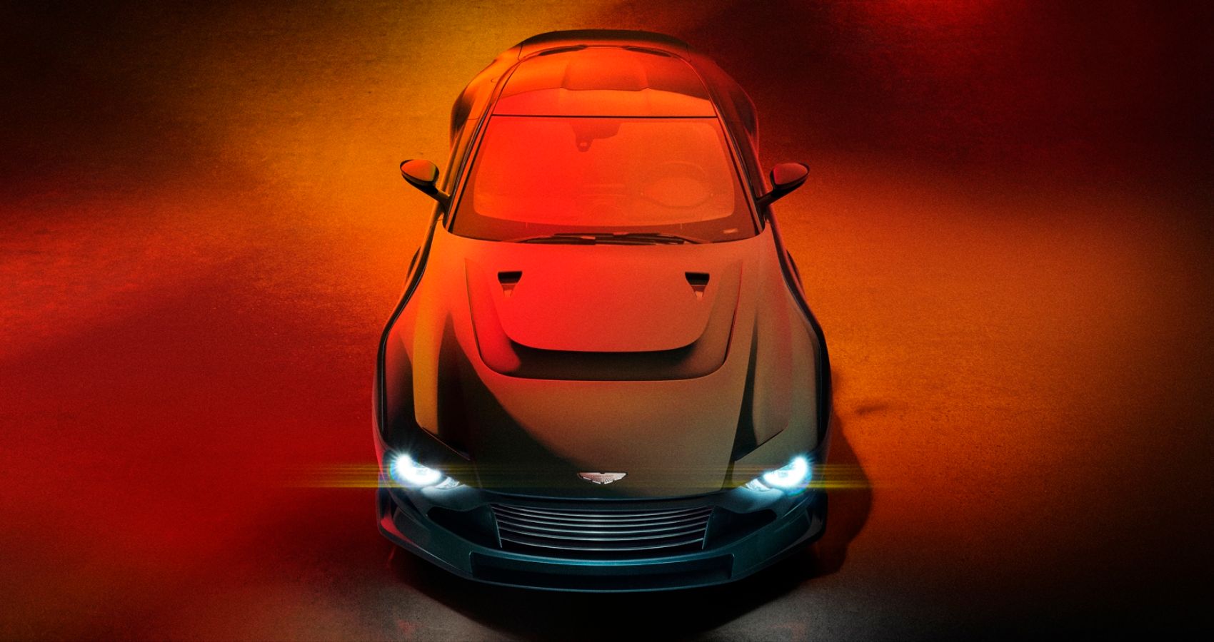 Vista frontal do Aston Martin Valour 2024 em estúdio escuro